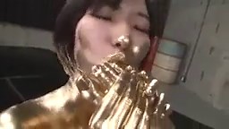 Asian lesbians paint each other gold