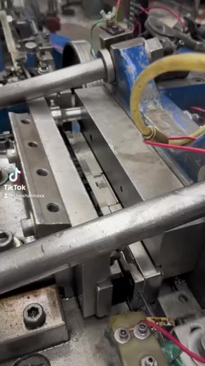 This is an example of our Fourslide stamping process. The Fourslide machine is extremely versatile, capable of working with wire, strip and shaped materials. In this video you can see steel 1074 strip being worked on in the stamping section and fed to a forming section for the final forming operation before exiting the machine for post production operations. This particular part continues on to hardening and then plating operations before being shipped to our customer. #springs #springmaking #sp