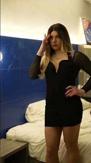 Crossdresser in tight black dress