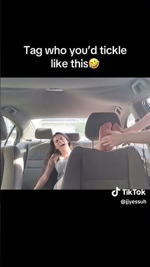 feet tickled in the car
