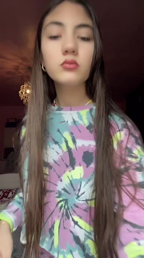 Vibrant Tie-Dye Outfit Showcase and Movement