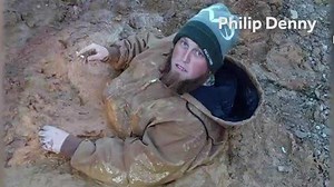 Crews rescue man stuck in mud for more than hour