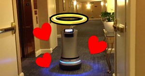 Woman orders snack from room service, gets delivered by robot.