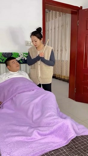 Humorous Bed Antics: Tapping Blanket Reactions