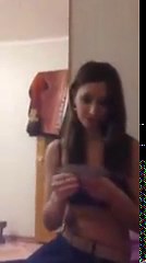 Girl loses in a game and has to take of her clothes