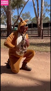 244K views · 1.6K reactions | Kangaroo Suit Creates Special Bond Man in kangaroo suit bonds with a joey. Heartfelt moment! #fblifestyle #AI Generated using Kling AI . . . (For entertainment purposes only. Consult professionals if guidance on activities is presented. No brand affiliation is implied if any are shown. If inspired by true events, creative adaptations may be included. Content may include public footage.) | Fabiosa - Live easy | Facebook
