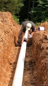 Laying Pipe for the Farm Pond | FarmCraft101