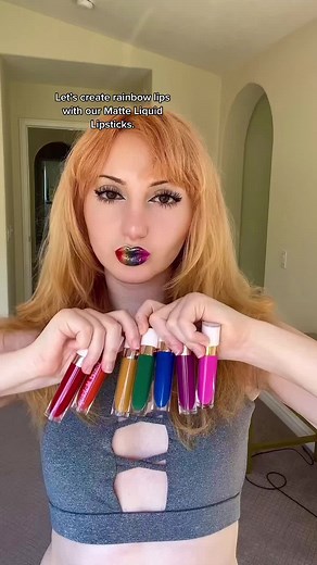 Rainbow lips with our Sunset Makeup matte liquid lipsticks #rainbowlips #rainbowlipgloss #rainbowmakeup #colorfulmakeuplook #colorfulmakeupchallenge #makeupchallenge #glossylips #lipcombo #mattelipstick #funmakeup #lipsticktutorial #swatchingmakeup #wlw #queertiktok #lesbian #lgbtq #nonbinary