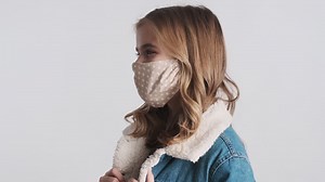 Free stock video - Happy teenage caucasian girl wearing face mask.