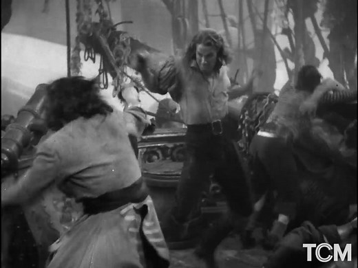 In CAPTAIN BLOOD ('35), the rousing final battle sequence with Blood's pirate crew storming French ships used one of the largest technical crews assembled for a film and 2,500 extras, each of whom was personally interviewed by director Michael Curtiz. | Turner Classic Movies: TCM