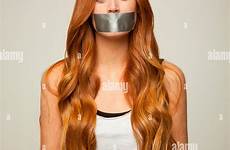 gagged tape woman young alamy shot silver studio stock