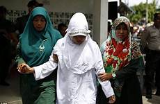 sex before marriage having muslim hooded woman sharia indonesia law aceh majority province accepted legal official system its which into