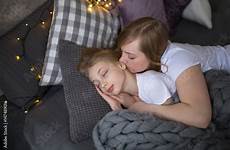 daughter sleeping mum embraces teenager comp contents similar search