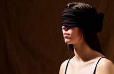 blindfolded brunette