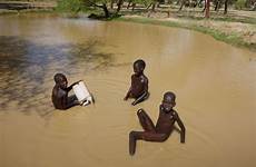 boys bathing sudan south village people africa water