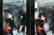 peeing men elevator woman pee inside camera tries viral two block over videos shanghaiist trending girls gay watching buddies cctv