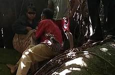 sex tricked girl police having into her while him indonesian woman shaman elderly hiding cave say years hs rescued identified