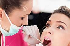 checking patient dentist woman her preview
