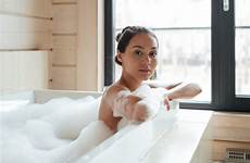 woman bathtub beautiful foam young realty local inc 2021