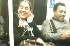 passenger strangers cuddle train her humiliated hides mortified friendly hands face over