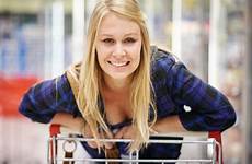 over bent cleavage bends her blonde shopping stock cart