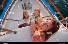 girls boat teen three bow aged sunset tour near stock alamy