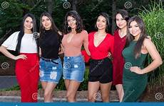 group hispanic teen friends female together young