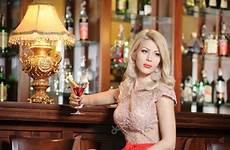 bar blonde woman stool elegant legs long sitting nude attractive dress hair model red showing heels gorgeous high provocatively her