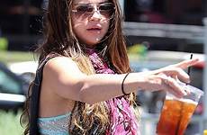 bra selena gomez flashing her shirt flashes ripped blue teen girls girl sexy top sleeves reveal wore floral she light