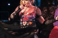madonna girl pulls fan down top low gone female wild exposes bare stage dress fans breast cut her stunned elsewhere