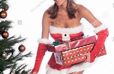 tree under christmas santa sexy helper blond placing delivering gifts them shutterstock stock search