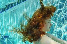 underwater swimming pool girl hair red teenage dissolve stock blend d145