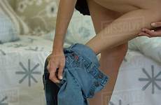 off jeans woman taking angle cropped low stock photoalto