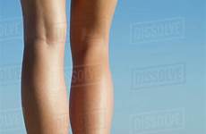 bare beach standing woman young legs close stock dissolve photoalto d984