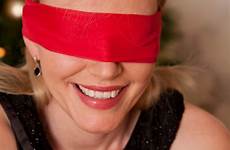 surprise blindfolded woman