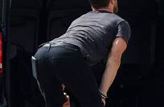 hemsworth chris his thor stretching jeans flight shows butt over bending bum tight hunk bend sept before celebrity plane off