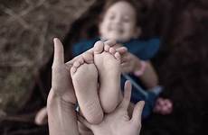 fingers maternal gentle holds