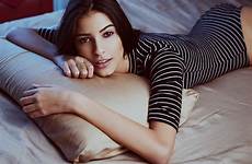 ass bed brunette body face photography eyes girl lying front hair brown model wallpaper leotard pillow thigh abdomen stripes hairstyle