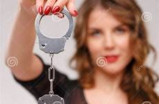 handcuffs woman sexual demonstrating holding stock girl preview