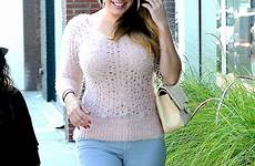 kelly brook curves tight sweaters la woollen sweater busting shows dailymail despite temperatures warm off her england lesbian knitted sunny
