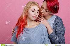 caress lesbian embrace two girls background gently each pink other preview