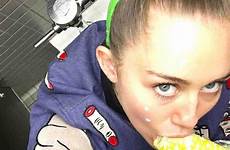 miley cyrus selfies suggestive provocative raunchy shoot old after shots her she continues run year frog hits dressing box updates