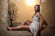 window lady legs sensual looking dress girl windowsill white long beautiful red behind sun her stock attractive standing female sitting
