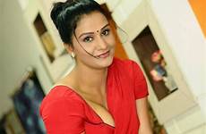 hot aunty apoorva saree actress cleavage red navel mallu sexy show telugu huge indian boobs south latest stills spicy tollywood