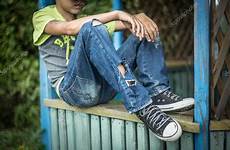 boy jeans dirty homeless torn stock child down her bowed head shower problem bench sits portrait take do refuses depositphotos