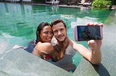 pool interracial couple premium selfie taking happy