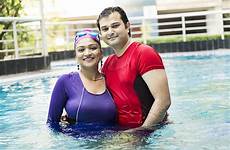 honeymoon couple indian hotel pool swimming
