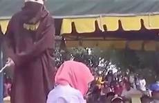 sharia lashed screaming screams beaten punishment indonesian