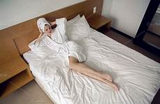 bed lying girl bathrobe people