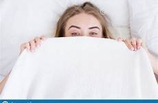 blanket rest hiding comfort shy lying sleeping lovely behind concept bed face woman young cute people her girl blank looking